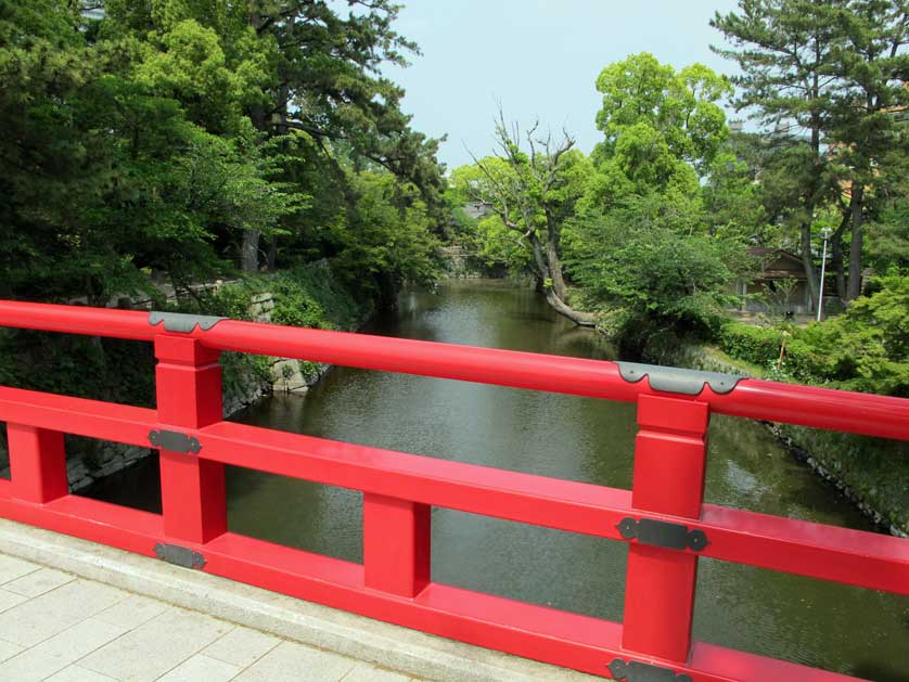 Okazaki Castle Park with castle moat and bridge.