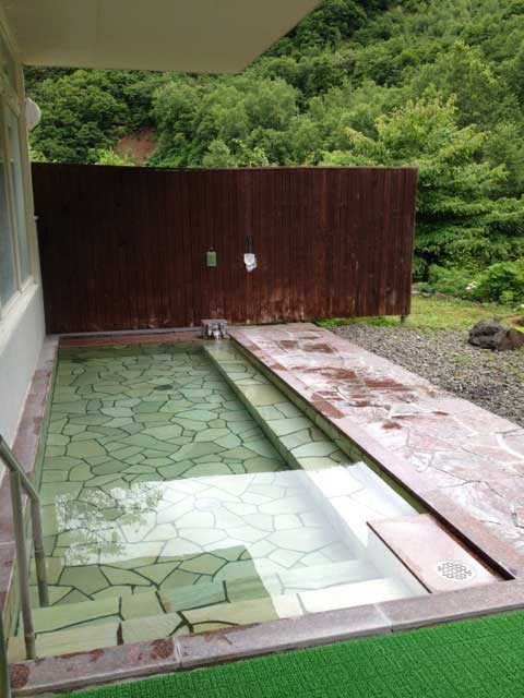 Outdoor hot bath in Japan.
