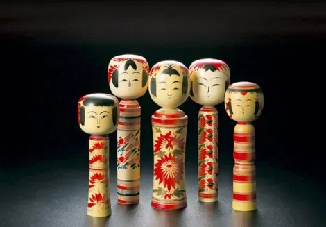 Kokeshi doll whose shape is reminiscent of statues of Jizo, the protector of missing children ...
