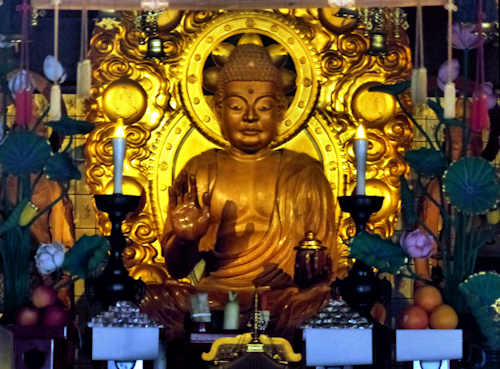 Modern statue of Yakushi Nyorai, the Healing Buddha in the main hall of Anrakuji Temple, Shikoku.