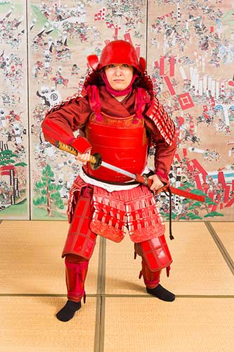 Visitors try on samurai armour in Sekigahara.