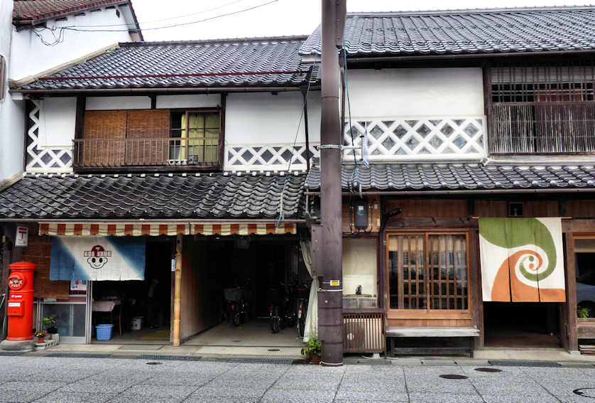Traditional architecture and contemporary noren in Katsuyama.