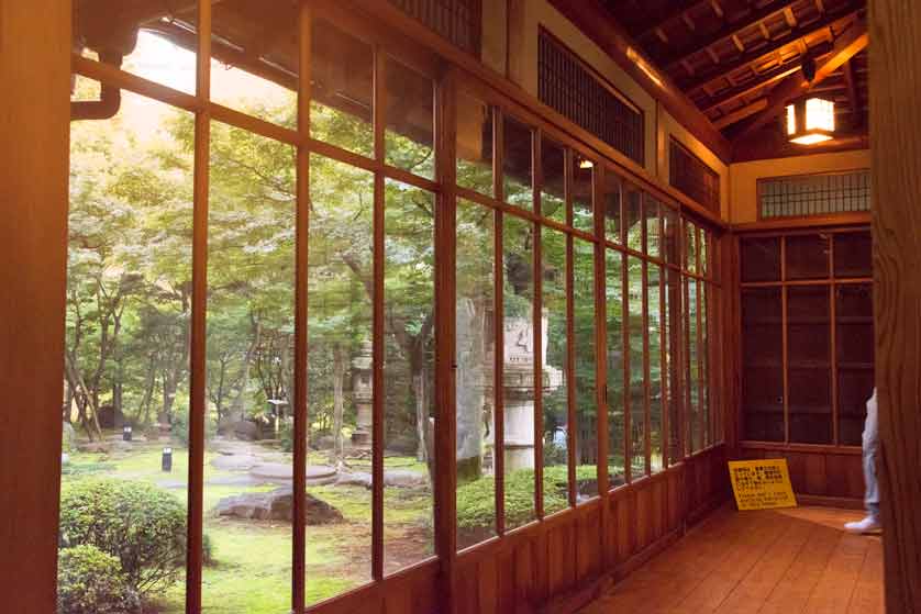 View of garden from inside Old Asakura House, Sarugakucho, Tokyo.