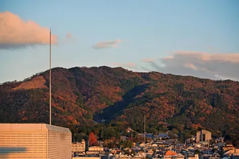 Mount Daimonji from the city of Kyoto. On the left side you can see the symbol of the fire which blazes for the Daimon-ji Gozan Okuribi festival.