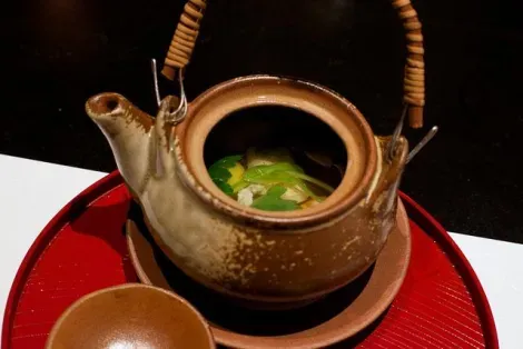 Broth Matsutake Dobin Mushi soup served in his foolscap.